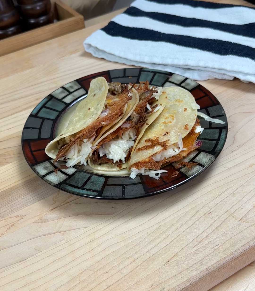 Crispy Cheddar Baby Back Rib Tacos Topped with Creamy Coleslaw on Corn Tortillas